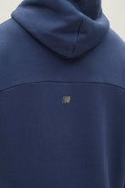 Diesel Walt Hoodie in Hugo Blue, close-up of the back hood, fabric and small motif.