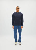 Diesel Jan Sweatshirt in Metro Navy, front model view showing the chest embroidery.