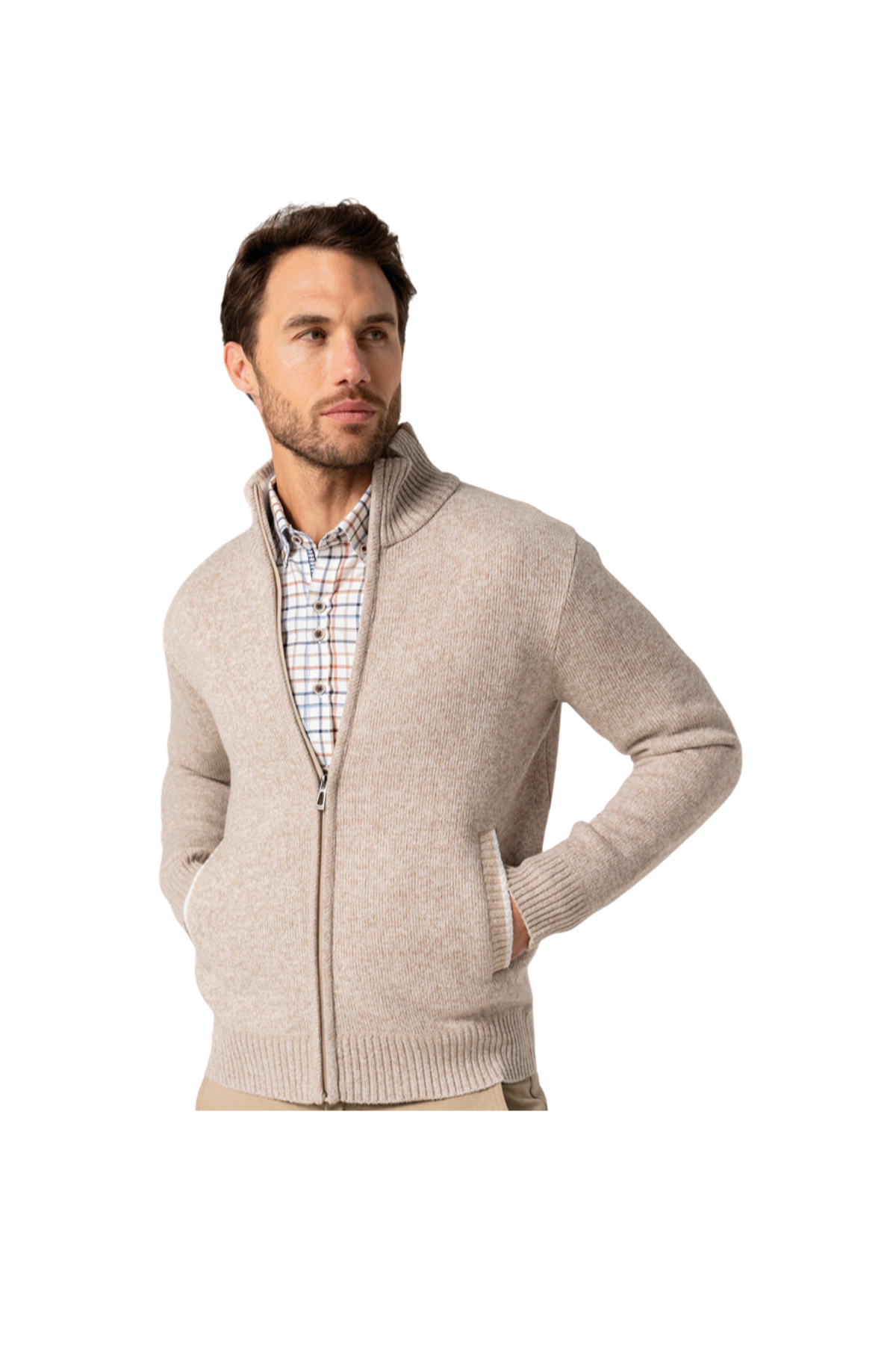 Man wearing a beige cardigan over a checkered shirt on a white background