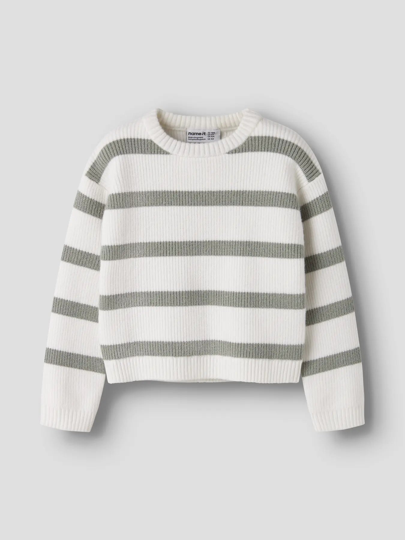 White and gray striped sweater on a light gray background
