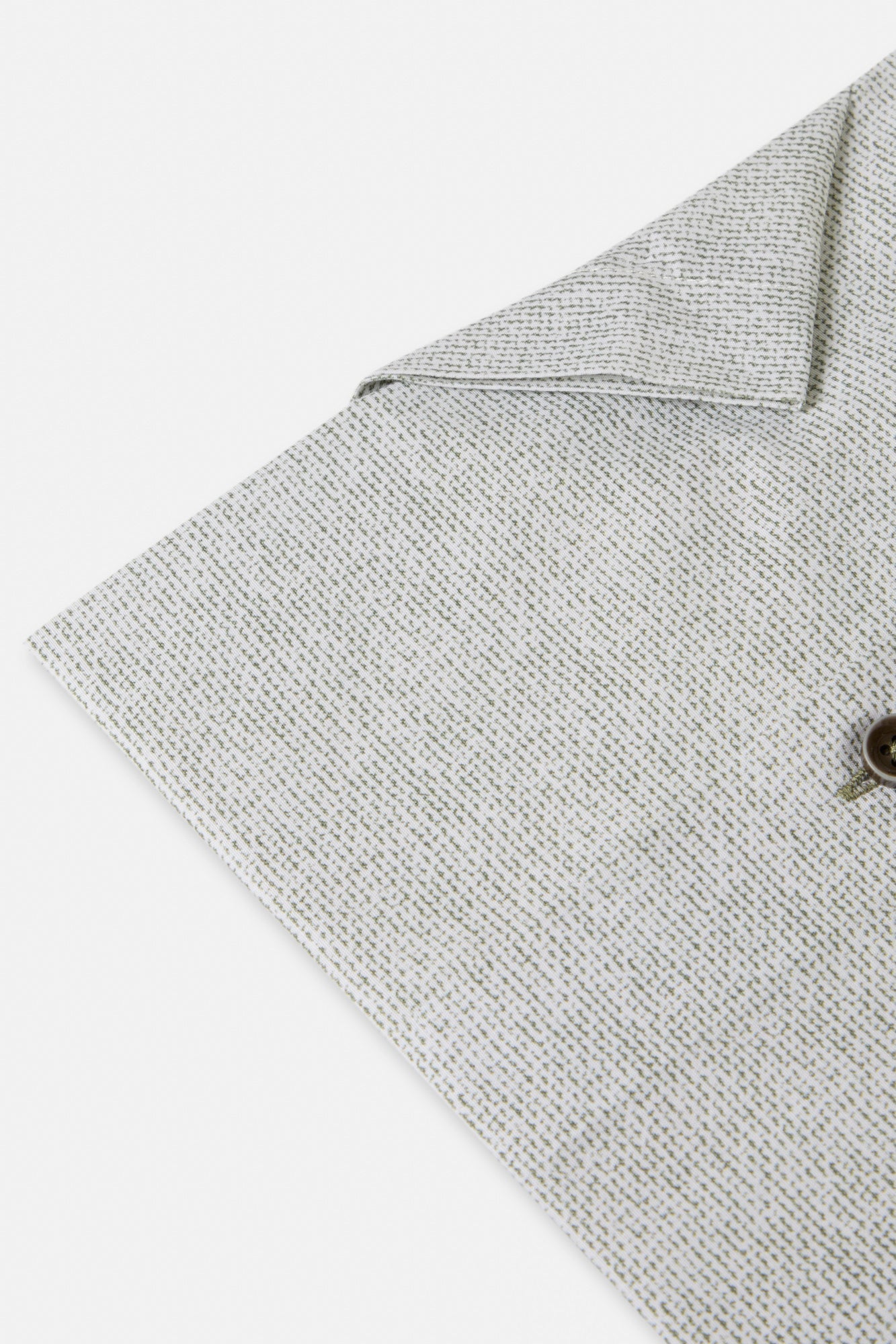 Close-up of the sage melange sleeve highlighting the cotton texture
