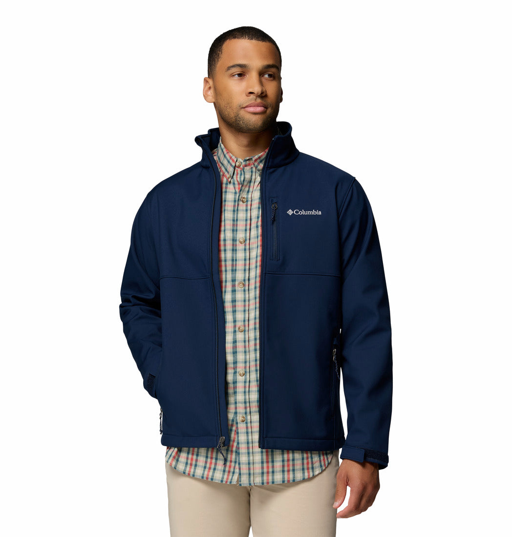 Man wearing a navy blue jacket with Columbia logo on a white background