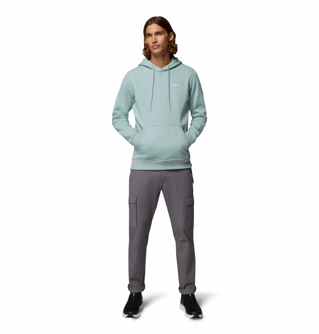 Man wearing a light blue hoodie with Columbia logo on a white background