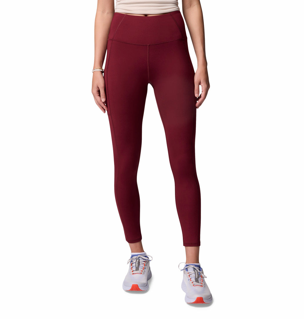 Maroon leggings worn by a person on a white background