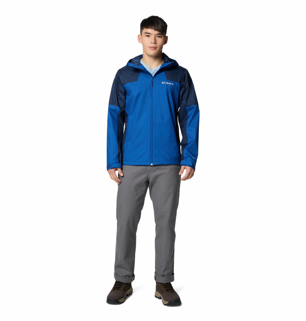 Person wearing a blue and gray jacket with Columbia logo on a white background