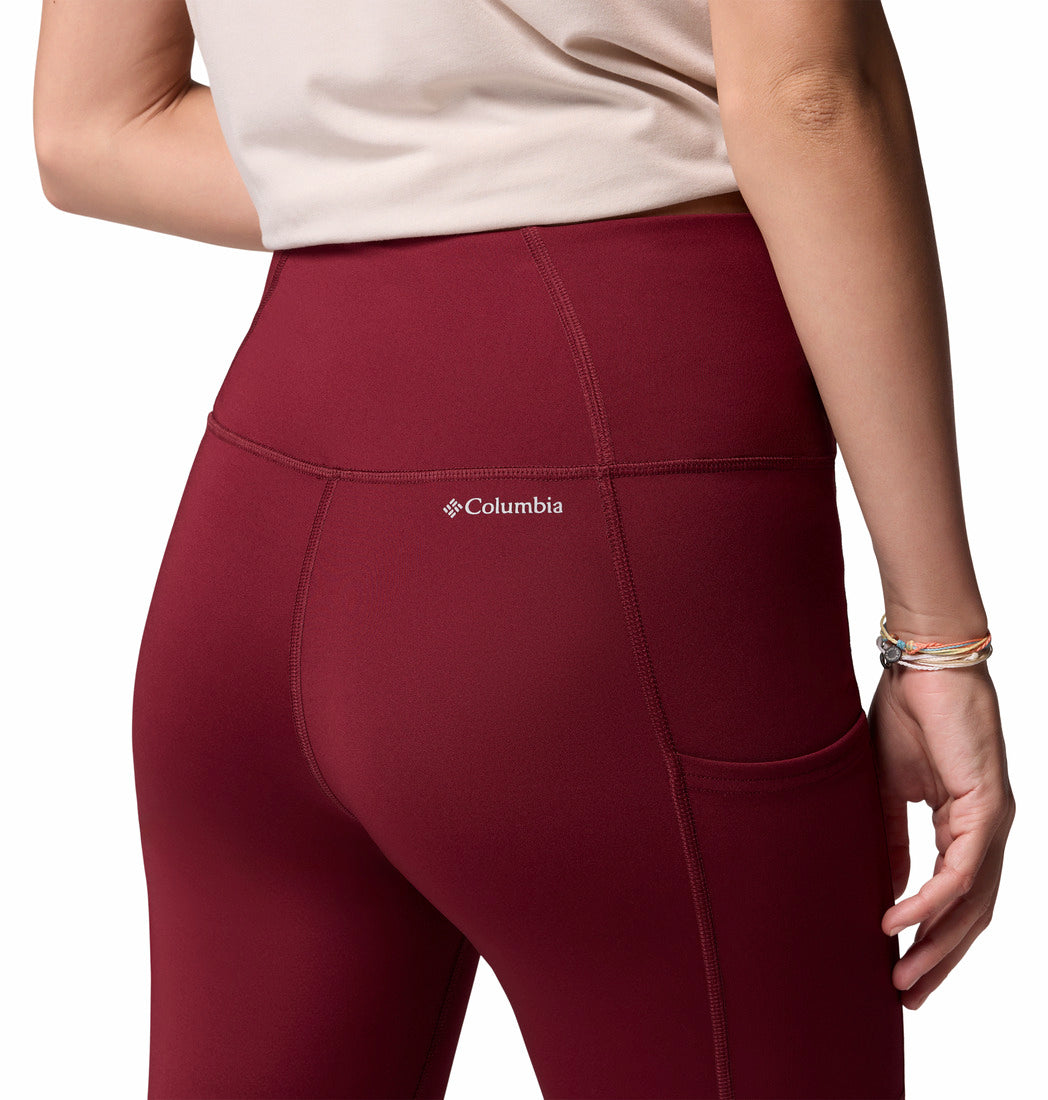 Maroon leggings with Columbia logo on a white background fro behind