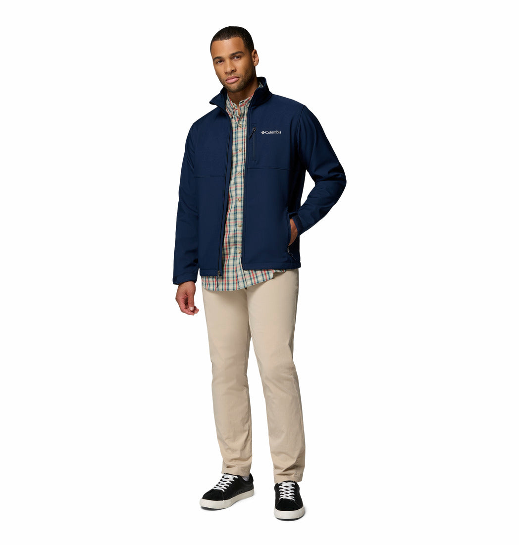 Man wearing a blue jacket with Columbia logo on a white background