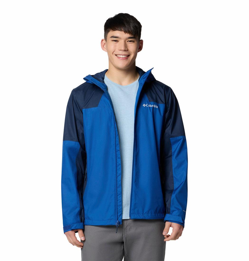 Person wearing a blue and navy jacket on a white background