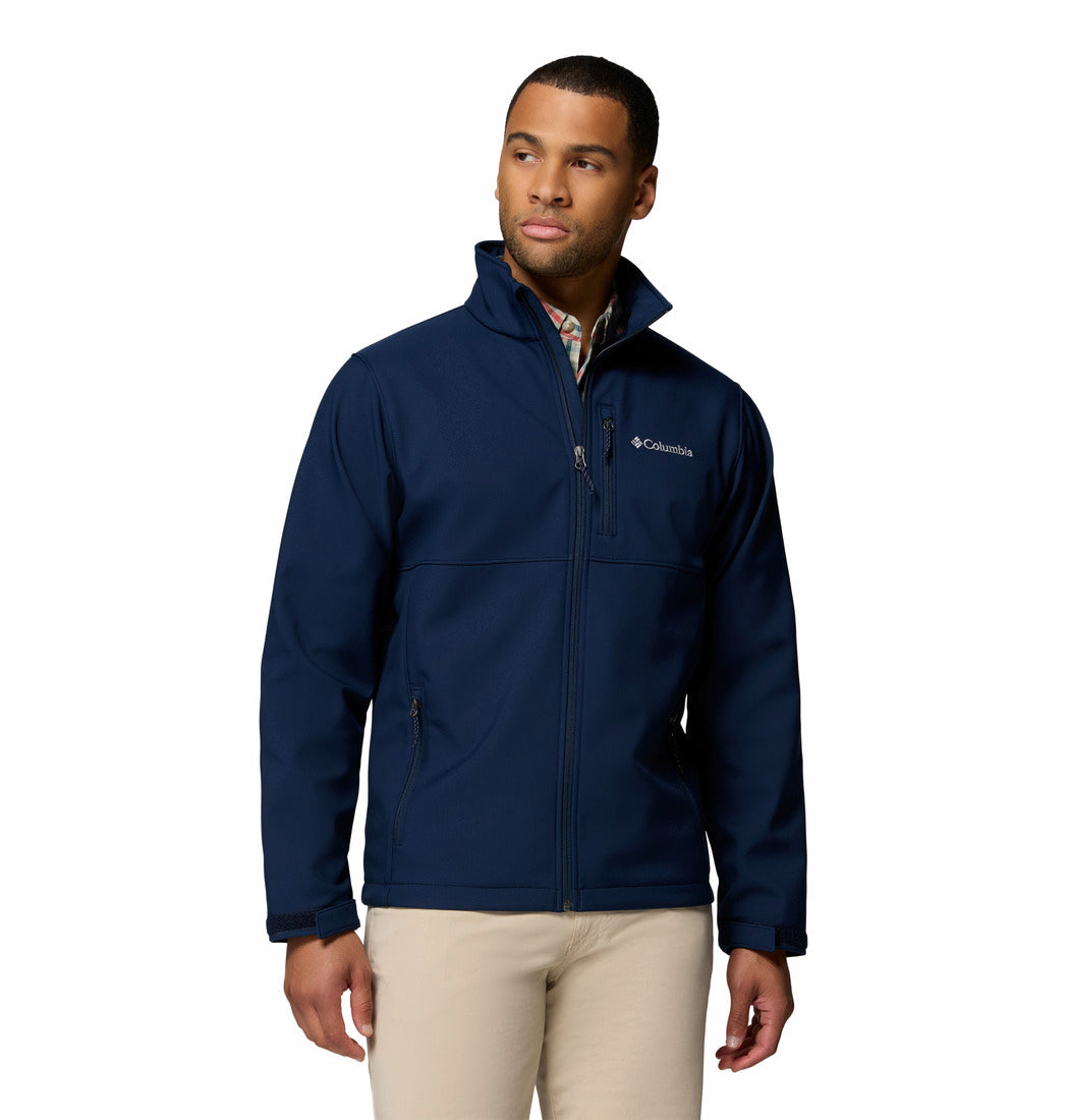 Man wearing a navy blue jacket with Columbia logo on a white background
