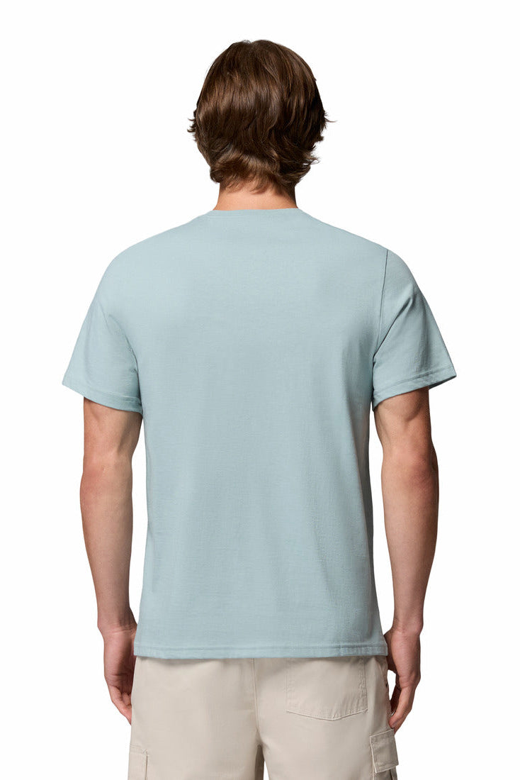 Person wearing a light blue t-shirt on a white background