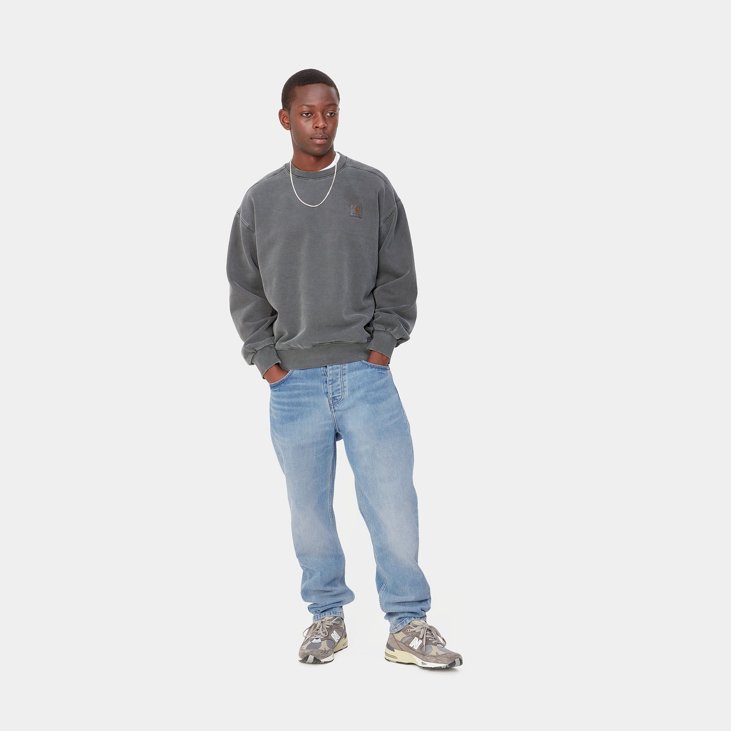 Carhartt WIP Newel Pant-Blue-Light Washed Blue model front view