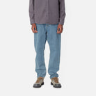 Model front view of Carhartt Newel Pant in Blue Stone Bleached