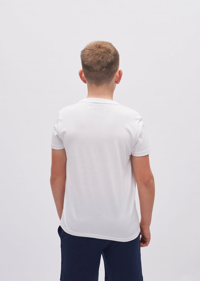 Person wearing a white t-shirt on a plain background