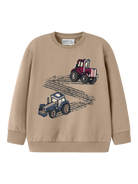 A beige crewneck sweatshirt featuring two pixelated tractor graphics on the front, one red and one blue, with tire tracks printed between them.