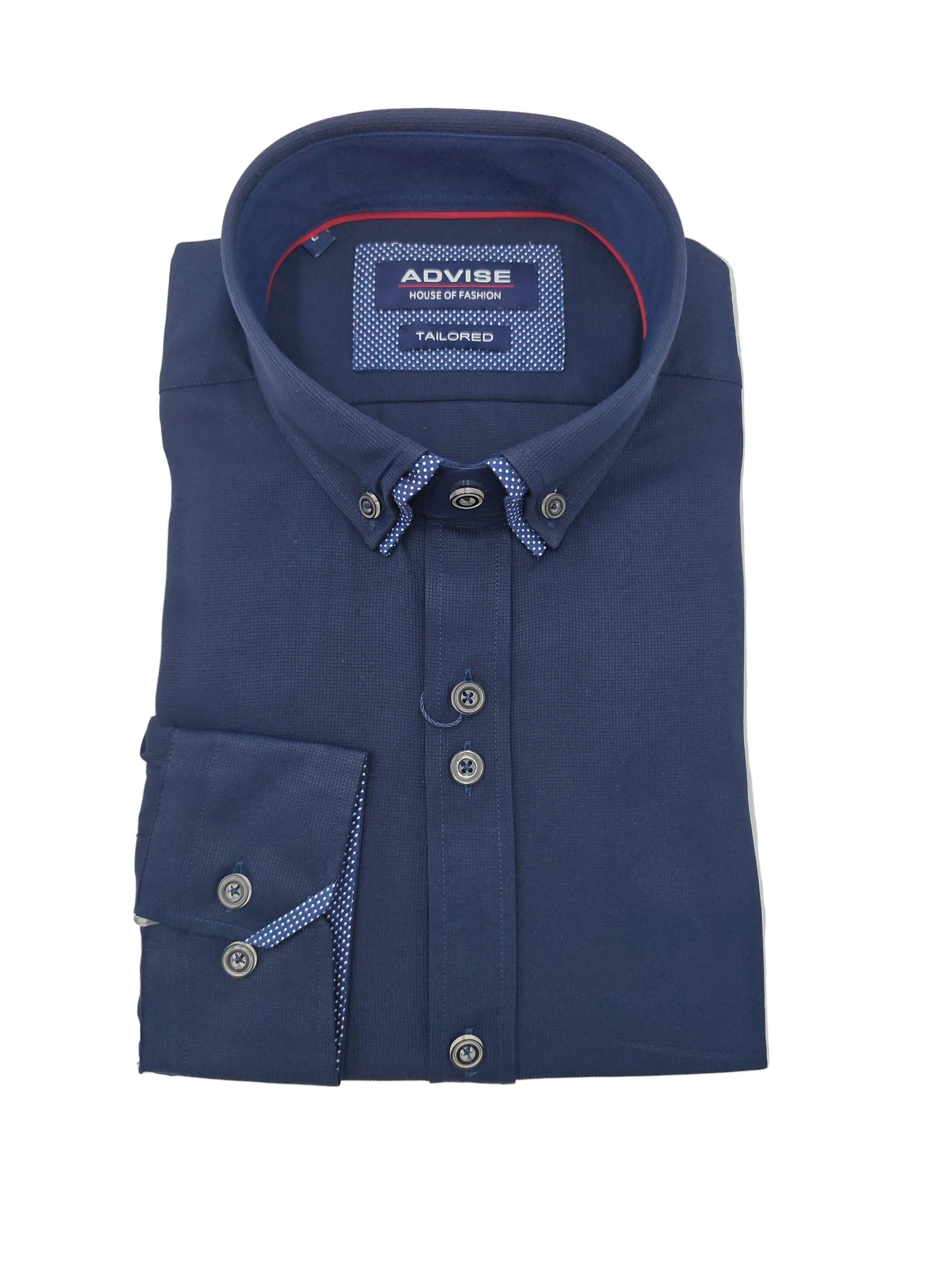 Folded navy shirt with Advise brand label on a light gray background