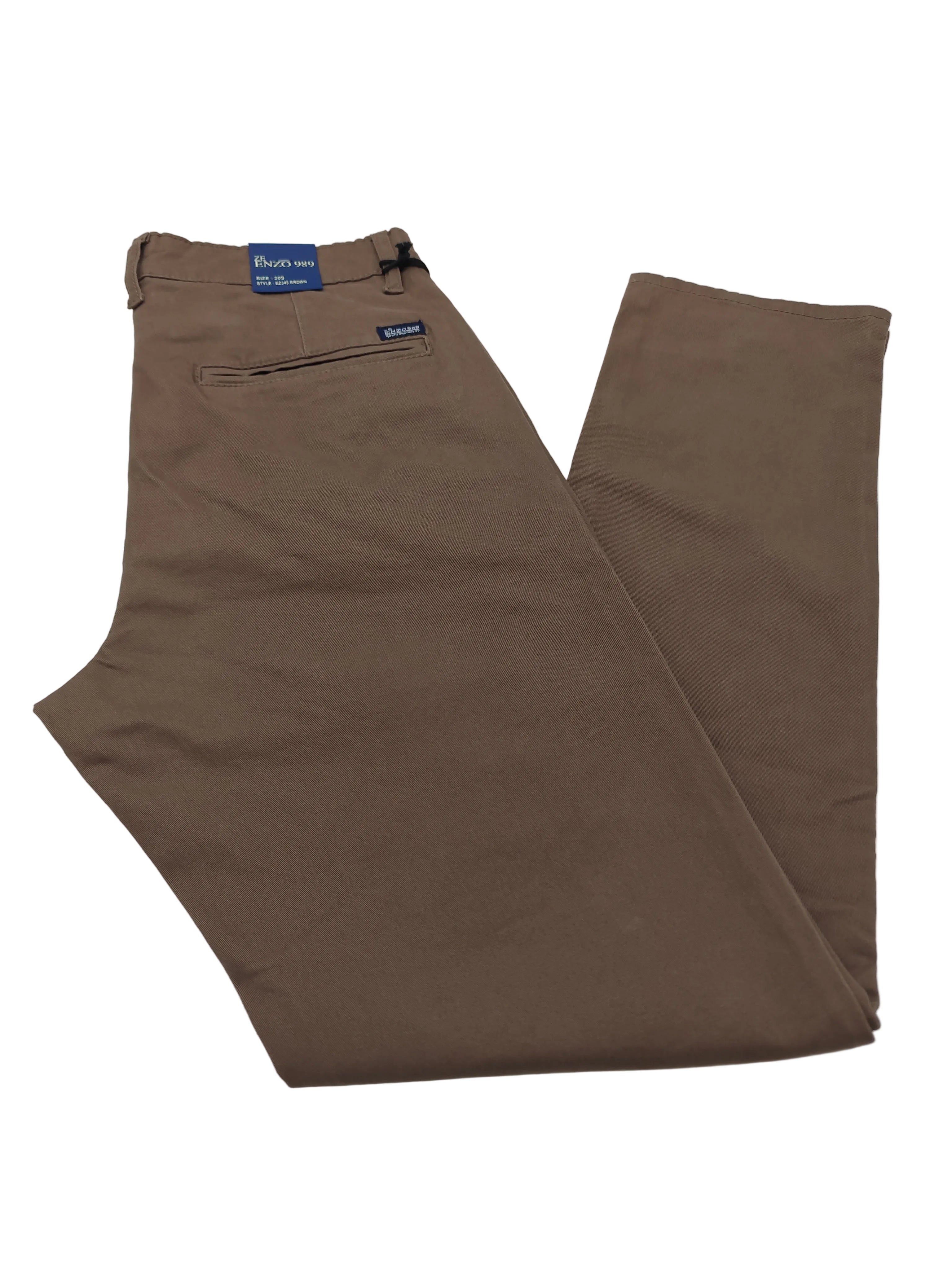 Brown chino pants with brand labels on a white background