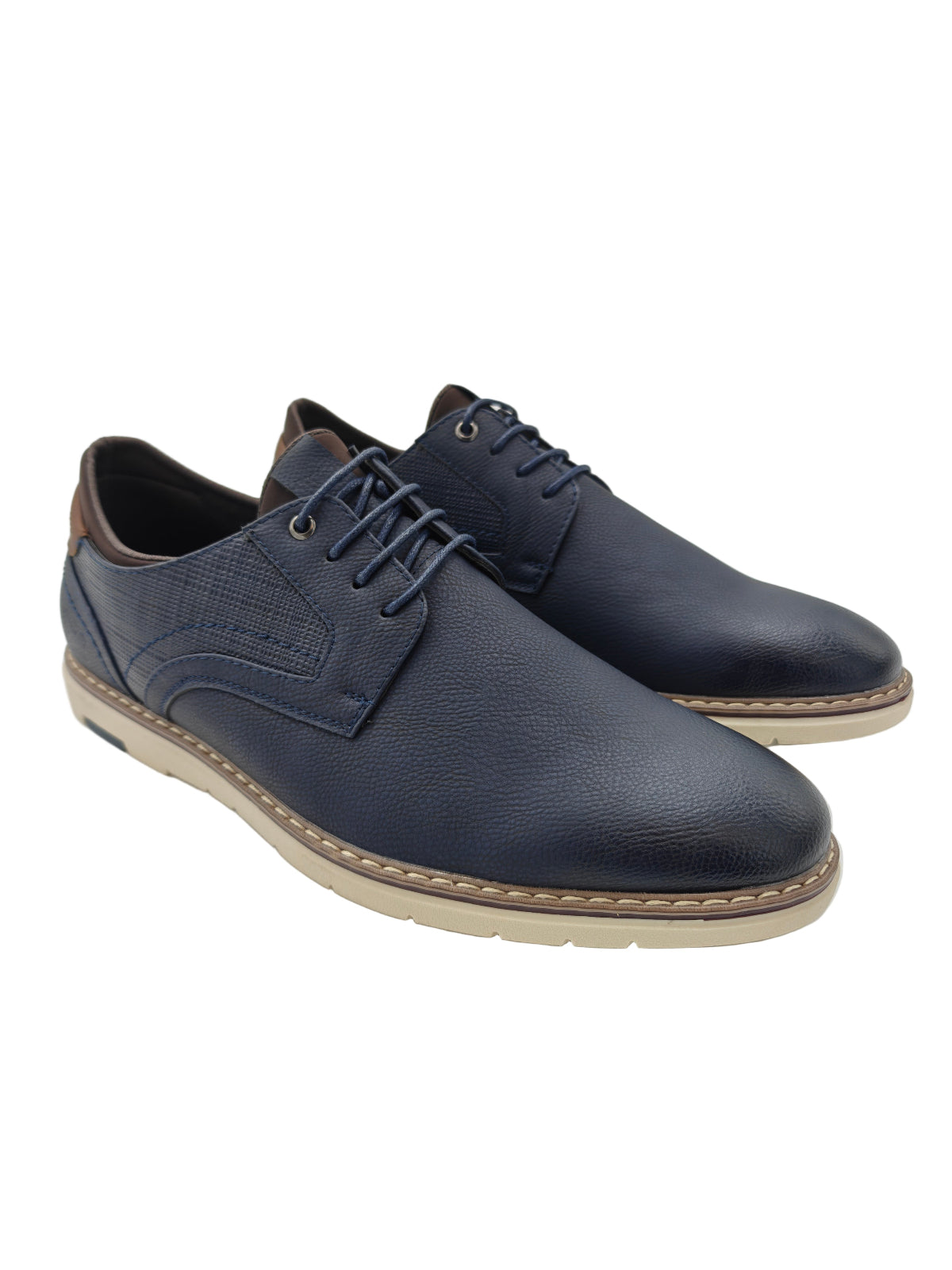 Pair of navy blue leather shoes on a white background