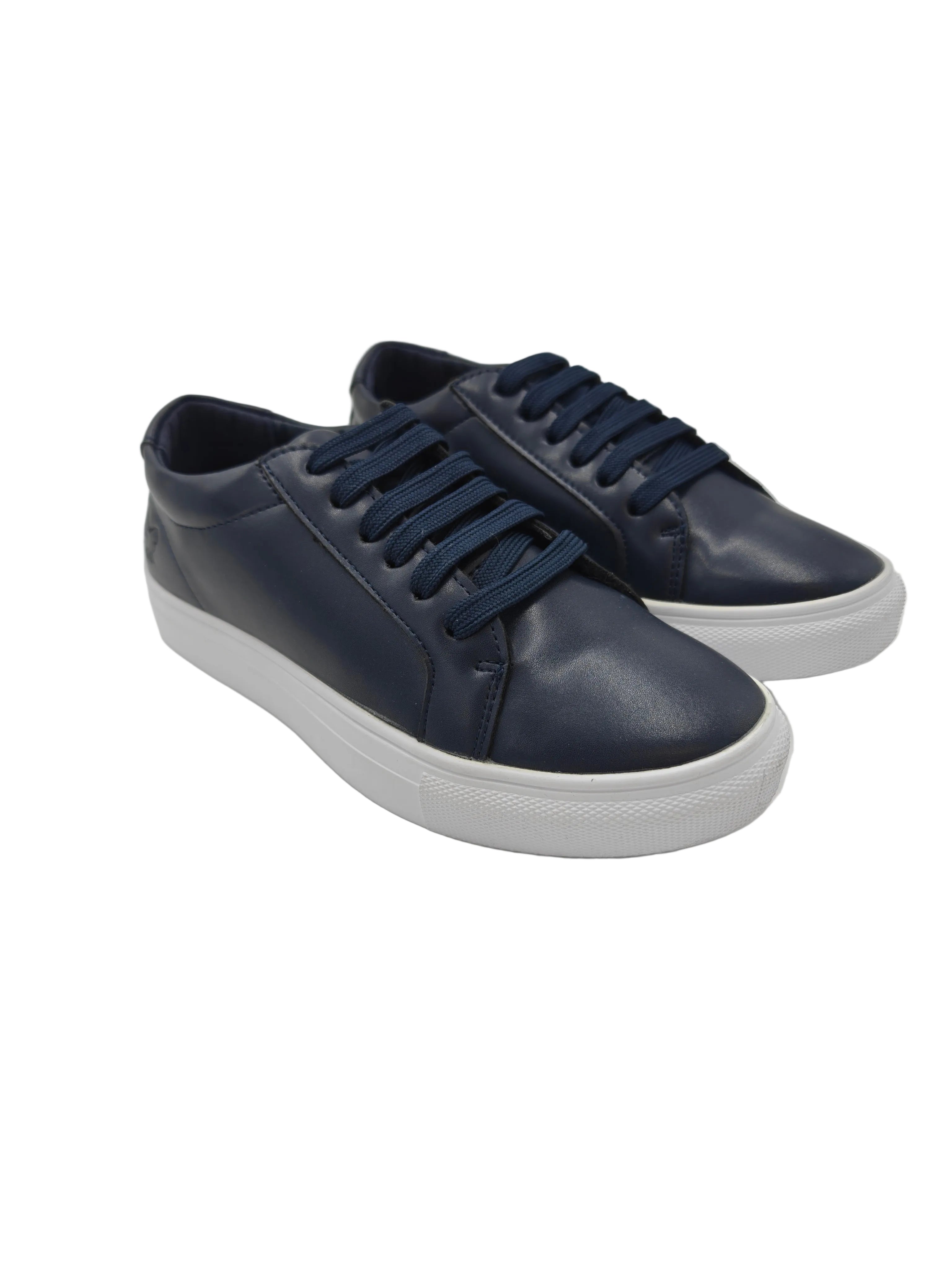 Pair of navy blue sneakers on a white surface with a reflective background