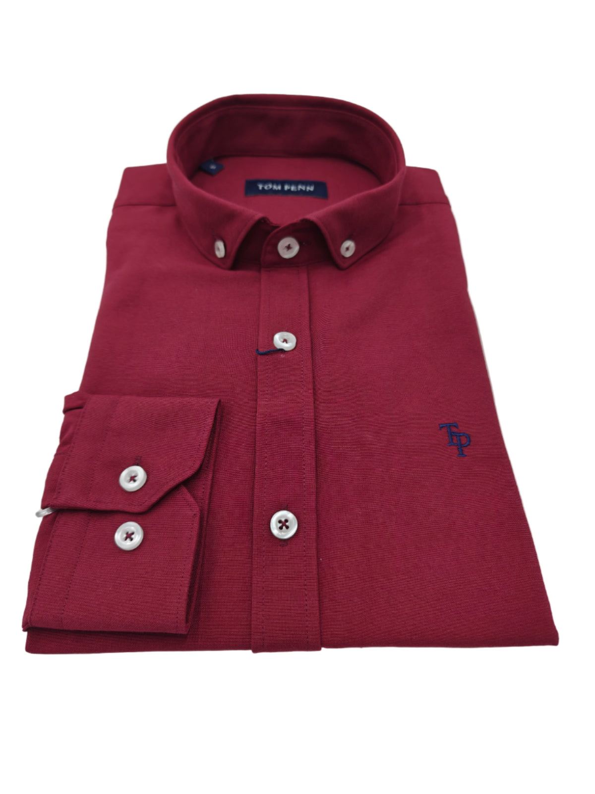 Folded maroon shirt with brand logo on a light gray background