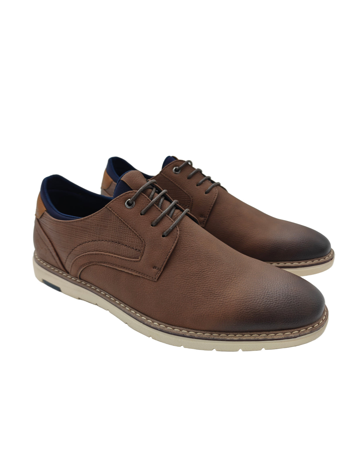 Brown leather shoes with brown laces on a white background