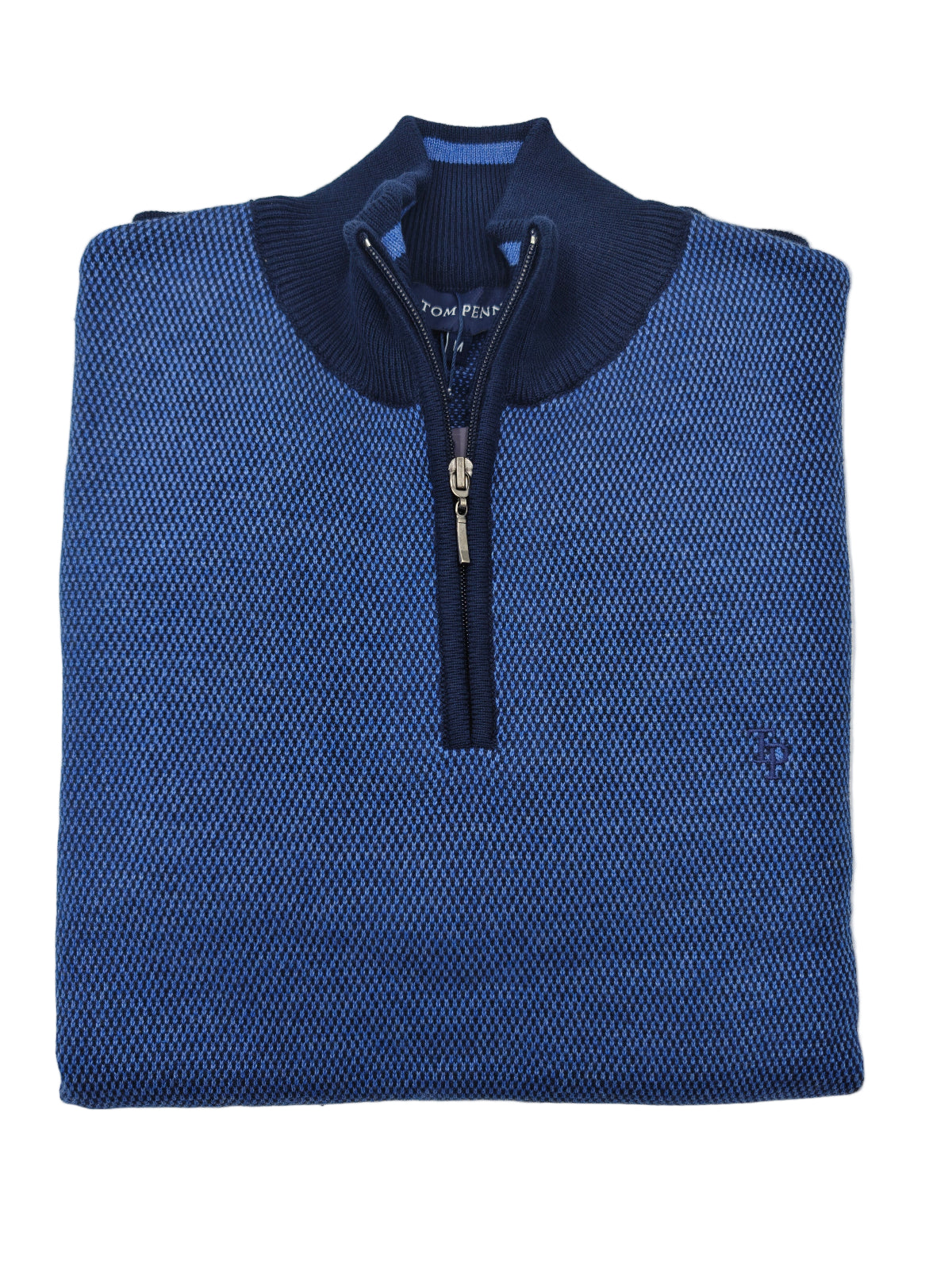 Folded blue sweater with a zipper on a light gray background