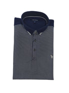 Folded front detail of Tom Penn men’s navy micro-dot polo shirt with button-down collar