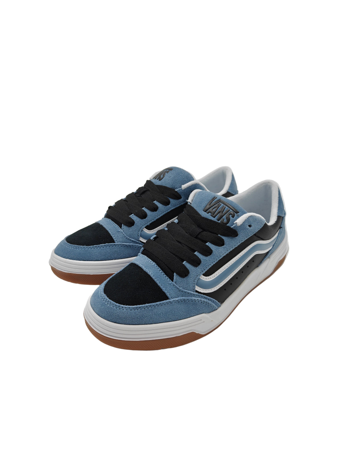 Pair of blue and black sneakers with brown soles on a white surface.