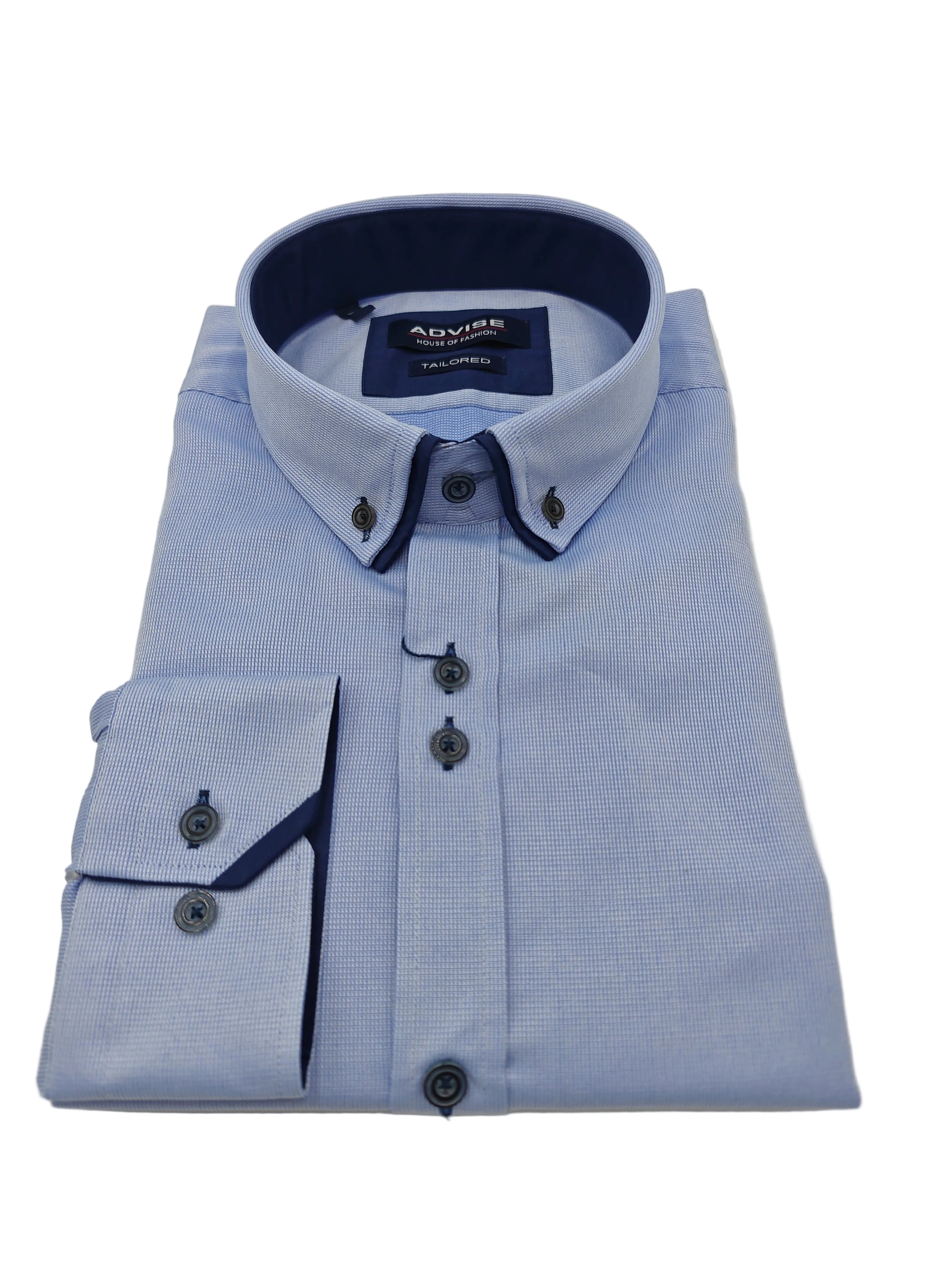 Folded light blue dress shirt with dark collar and trim on a white background