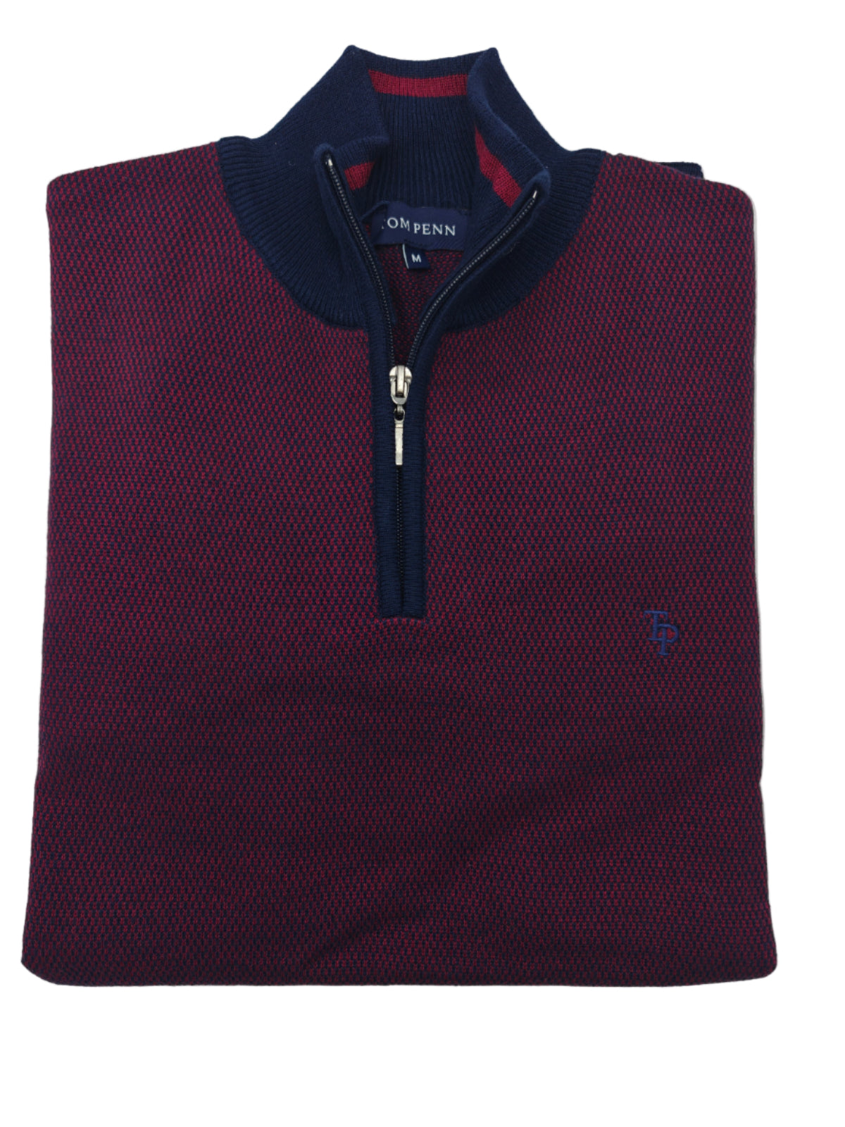 Folded maroon sweater with navy zipper and brand logo on a white background