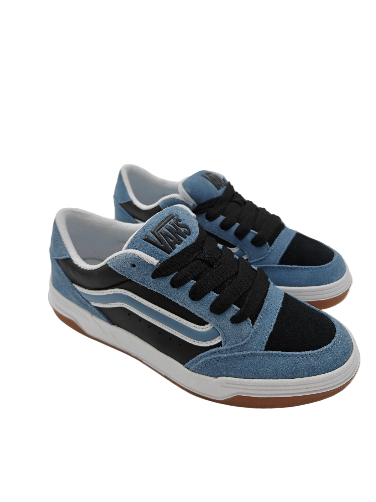 Blue and black sneakers with a visible brand logo on a white surface.