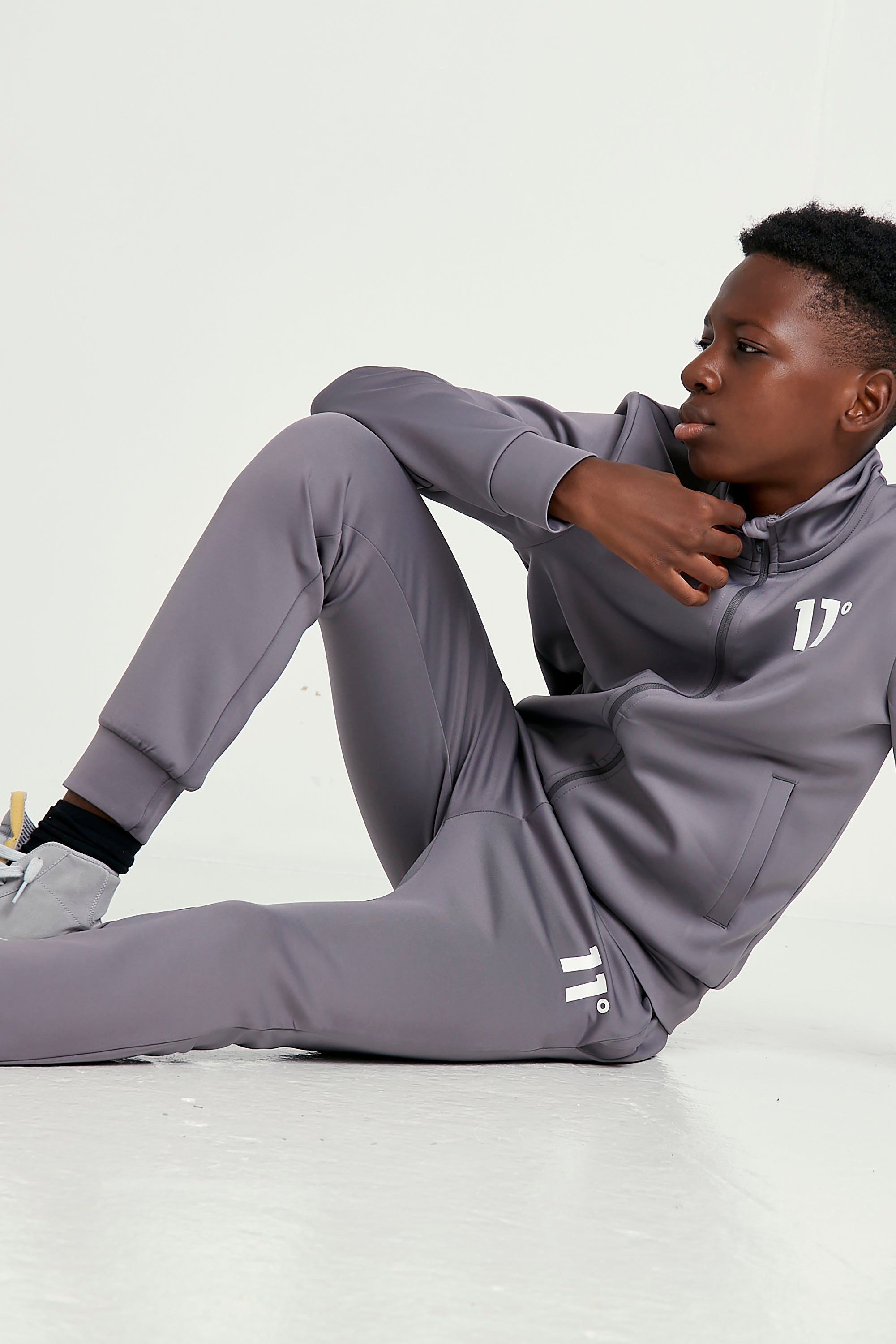 Core Poly Steel Boys Tracksuit-Creative view
