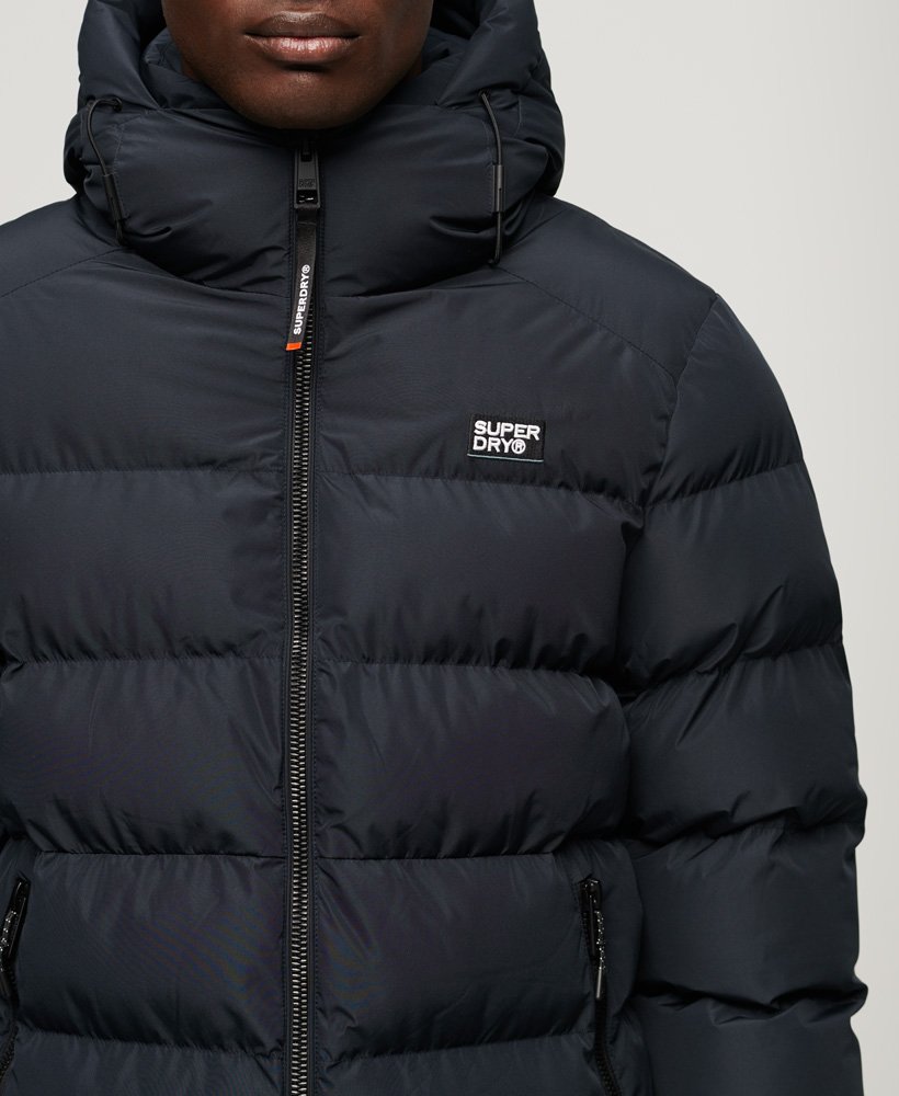 Hooded Sports Puffer Jacket-Eclipse Navy-Chest logo view