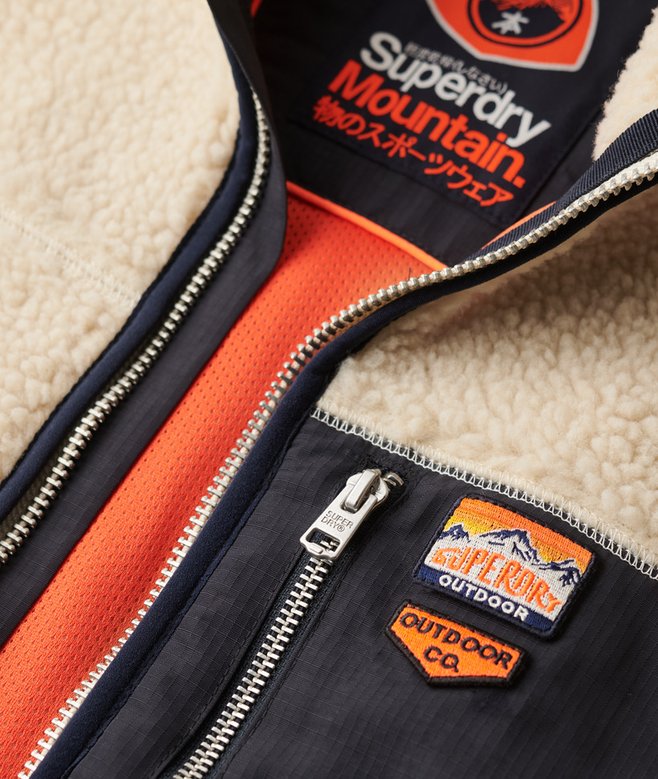 Close-up of a Superdry jacket with visible branding and design details.