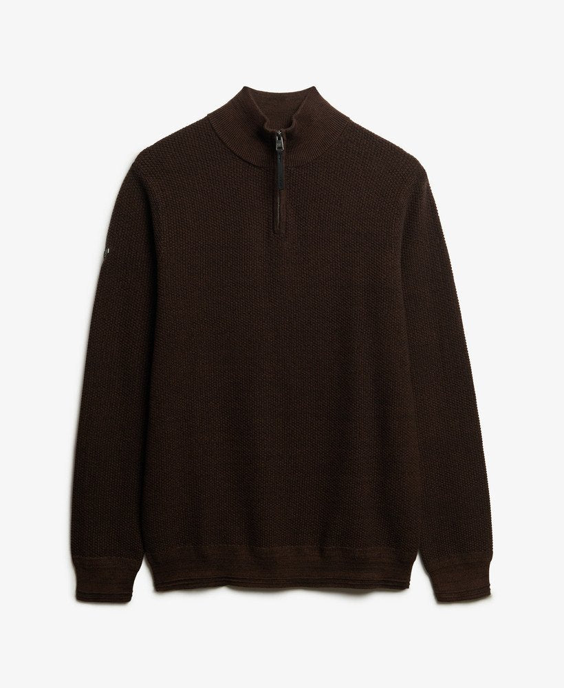 Brown sweater with a zipper on a light gray background
