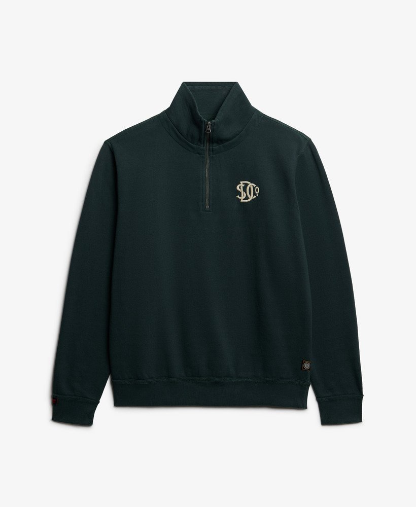 Green quarter-zip sweatshirt with a logo on a light gray background