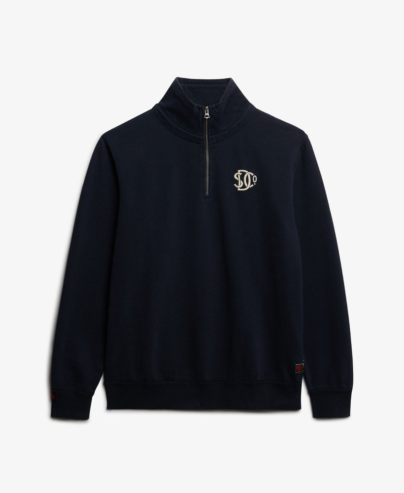 Navy blue quarter-zip sweatshirt with a logo on a light gray background
