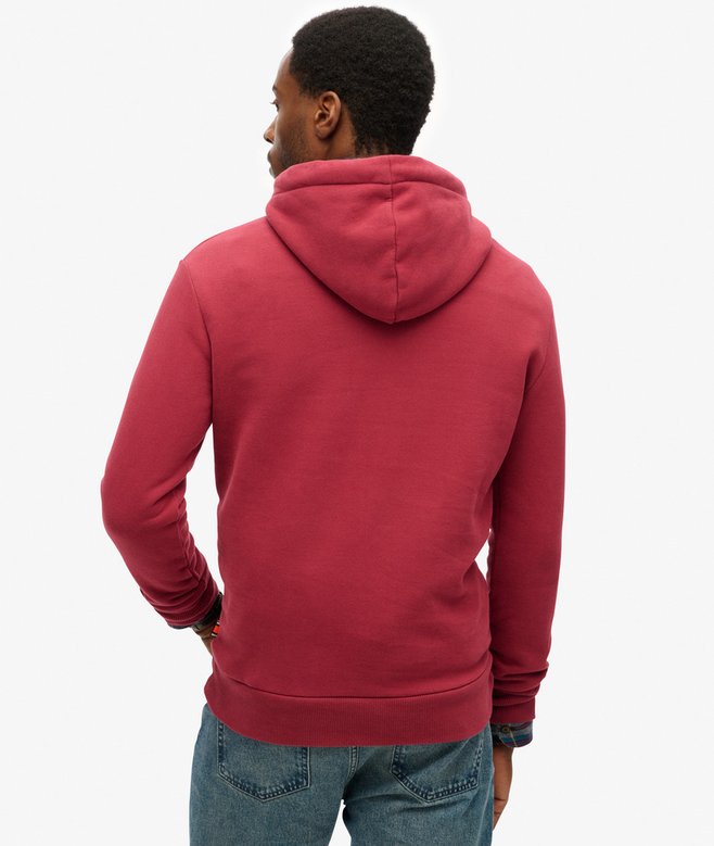 Person wearing a red hoodie from behind on a white background