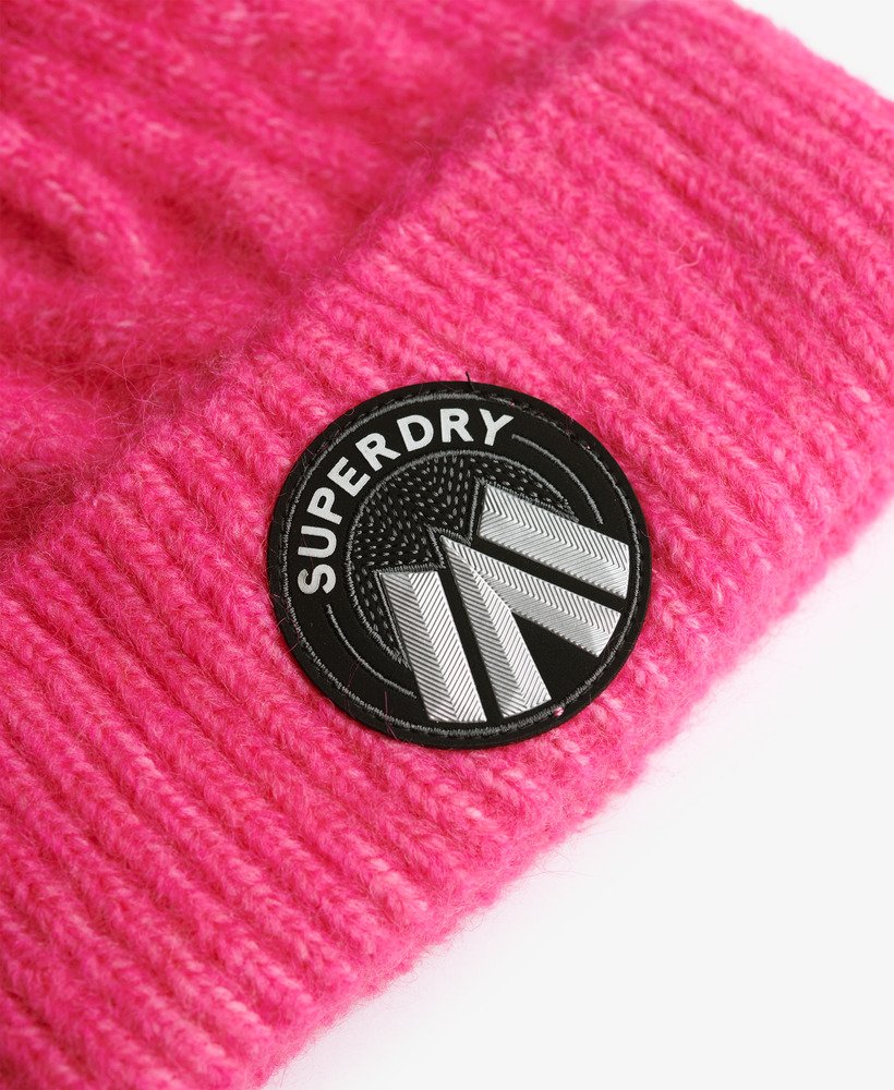 Superdry Ladies Cable Luxe Knit Beanie Hat-Hyper Magenta Pink Hyper Magenta Pink model front view
