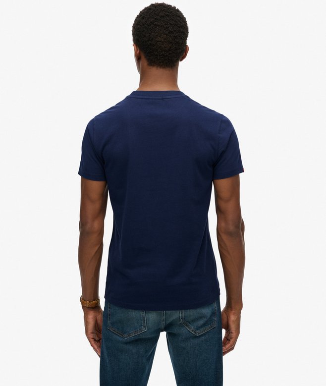 Person wearing a navy blue t-shirt on a white background