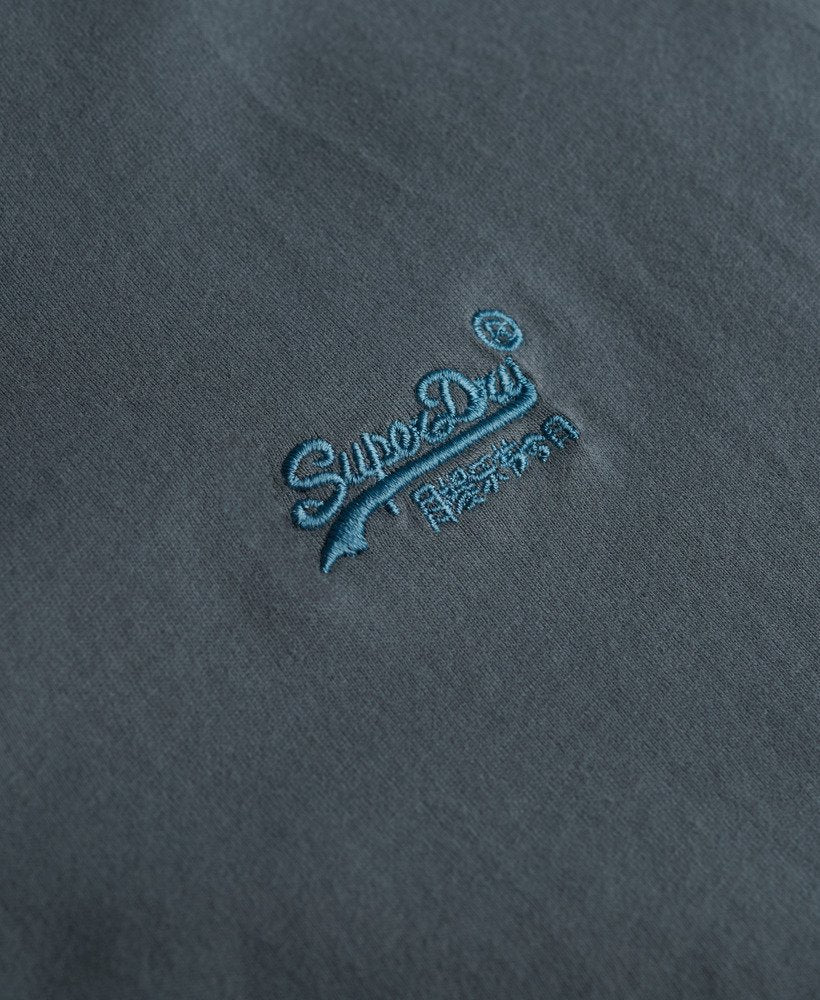 Blue Superdry logo on a dark gray background