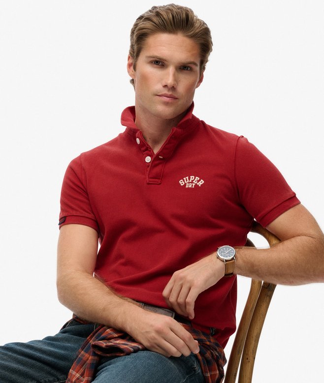 Vintage Athletic Embroidered Polo in Preppy Red-Model sitting down