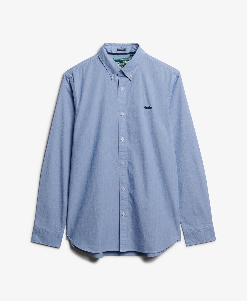 Blue button-up shirt on a white background
