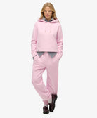 Superdry Ladies Essential Logo Emb Hood Hb-Pink Lady Pink Lady model front view