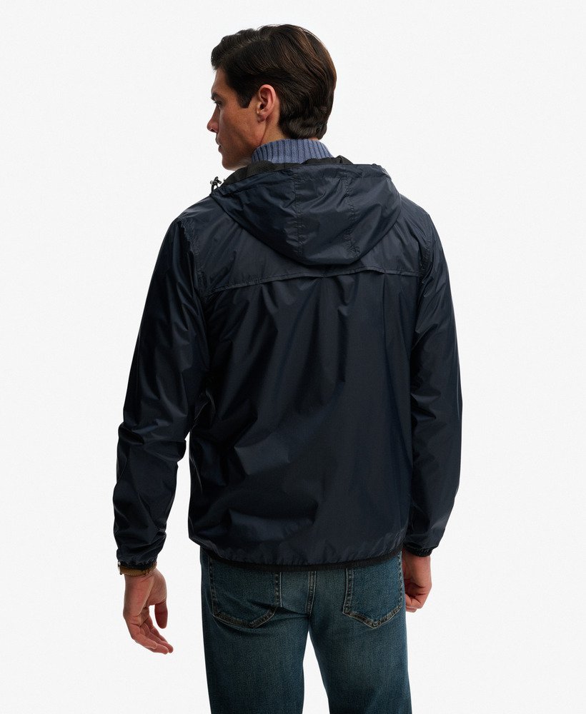 Man wearing a black jacket on a white background