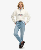 Superdry Ladies Ath Ess Graphic Half Zip-Desert Bone Off White Desert Bone Off White model front view