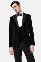 Model front view of black velvet waistcoat