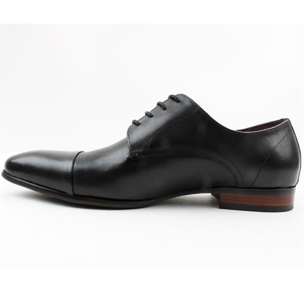 Side view of Morgan and Co black lace-up toe cap shoe