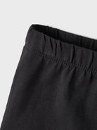 NAME IT Vivian Solid Short Legging Dark Sapphire model front view