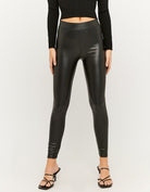 Front view of black faux leather leggings for women