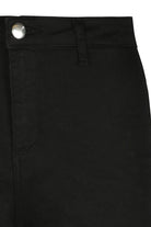 Side view of women's black denim shorts